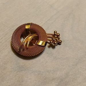 Gold color brooch